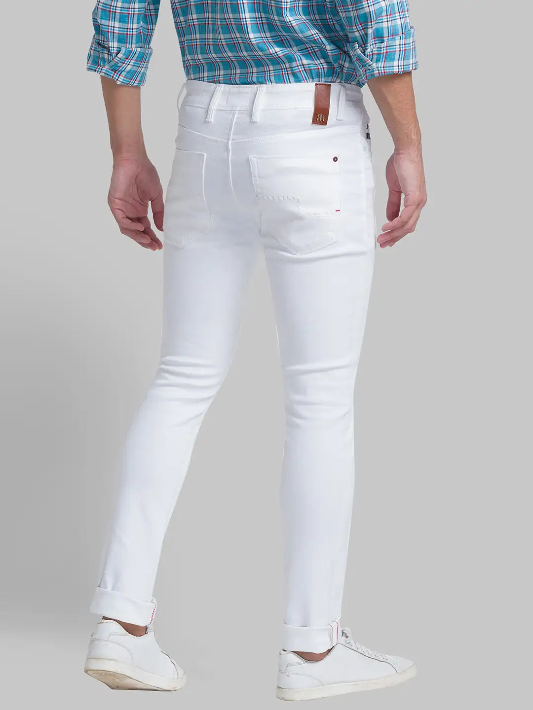 Men White Slim Fit Solid Cotton Blend Jeans